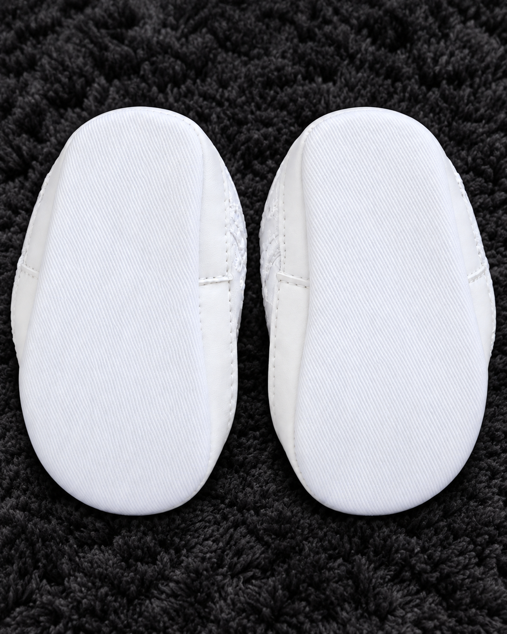 Carter's white eyelet baby shoes size 0-3 months sole view