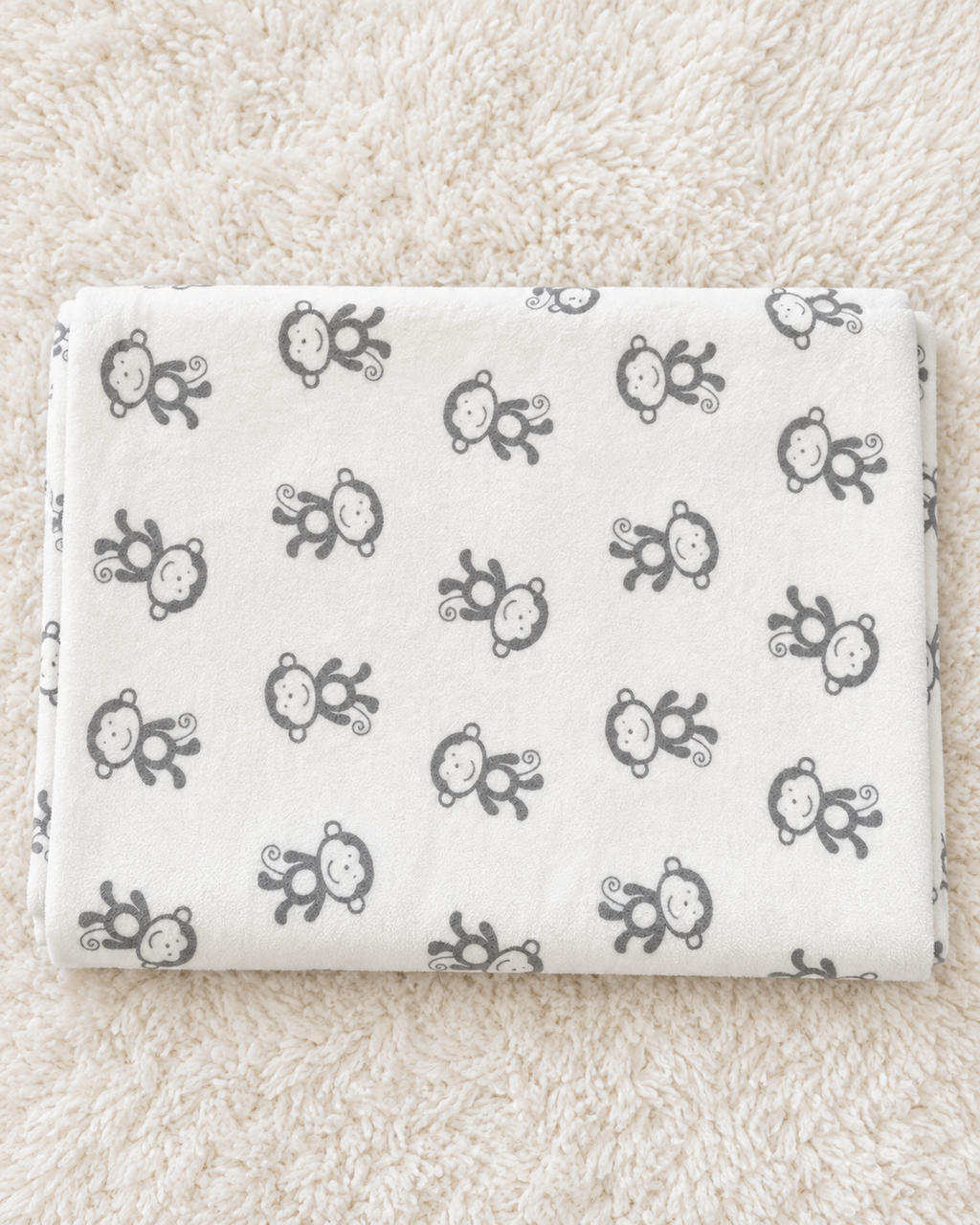 Circo white baby blanket with gray monkey print