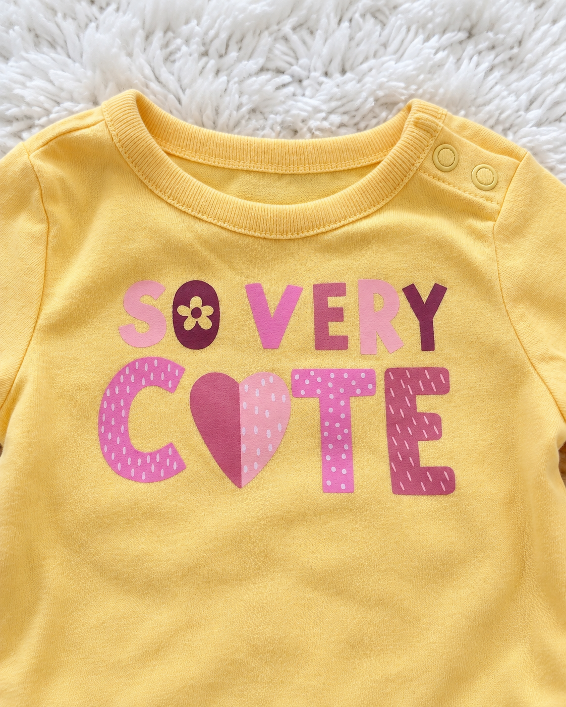 Close-up of So Very Cute graphic on Garanimals bodysuit
