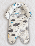 Weather print infant support insert front on white rug