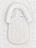 White and gray star infant support insert front on white rug