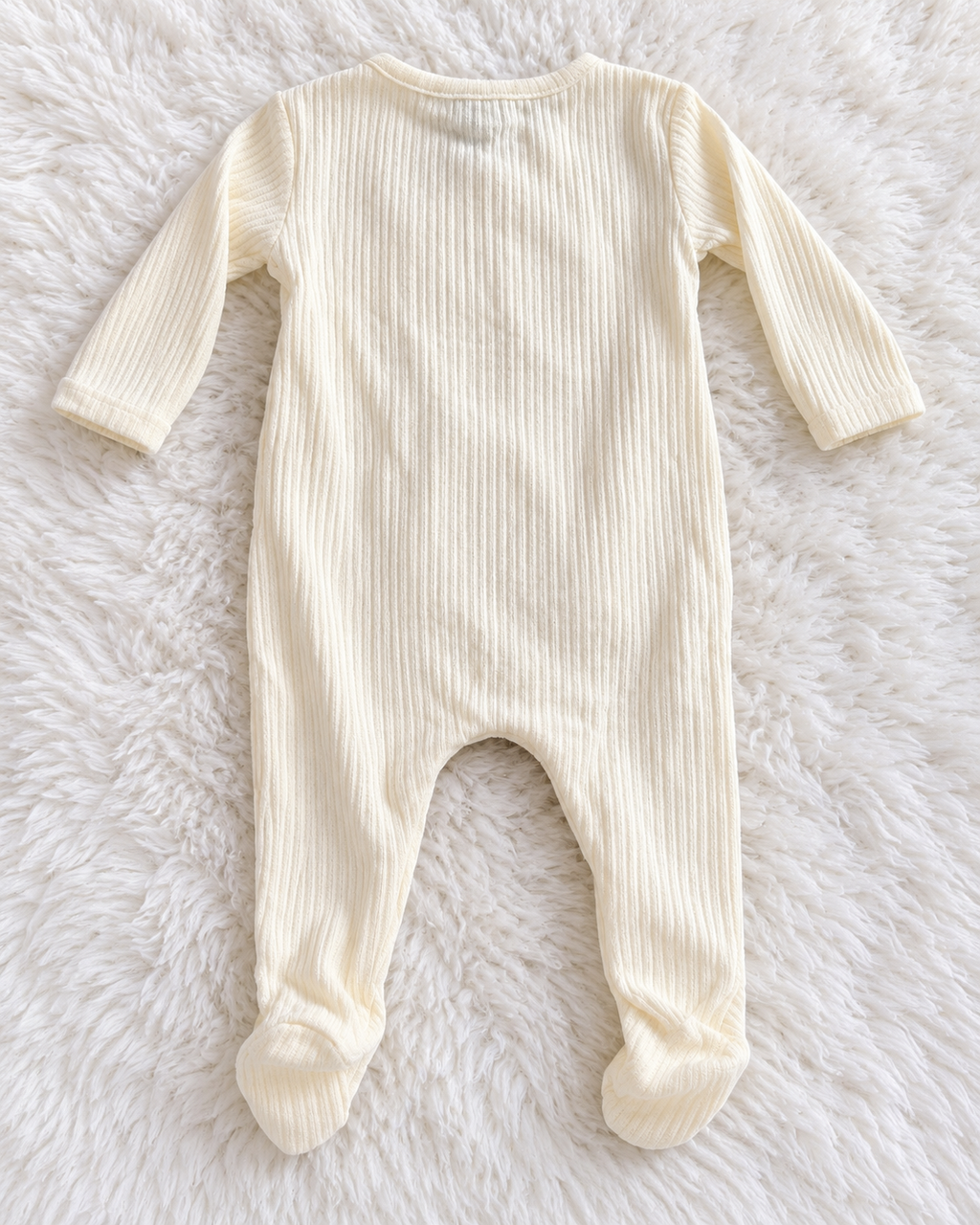 Back of Grayson Collective white ribbed footed romper size 0-3 months