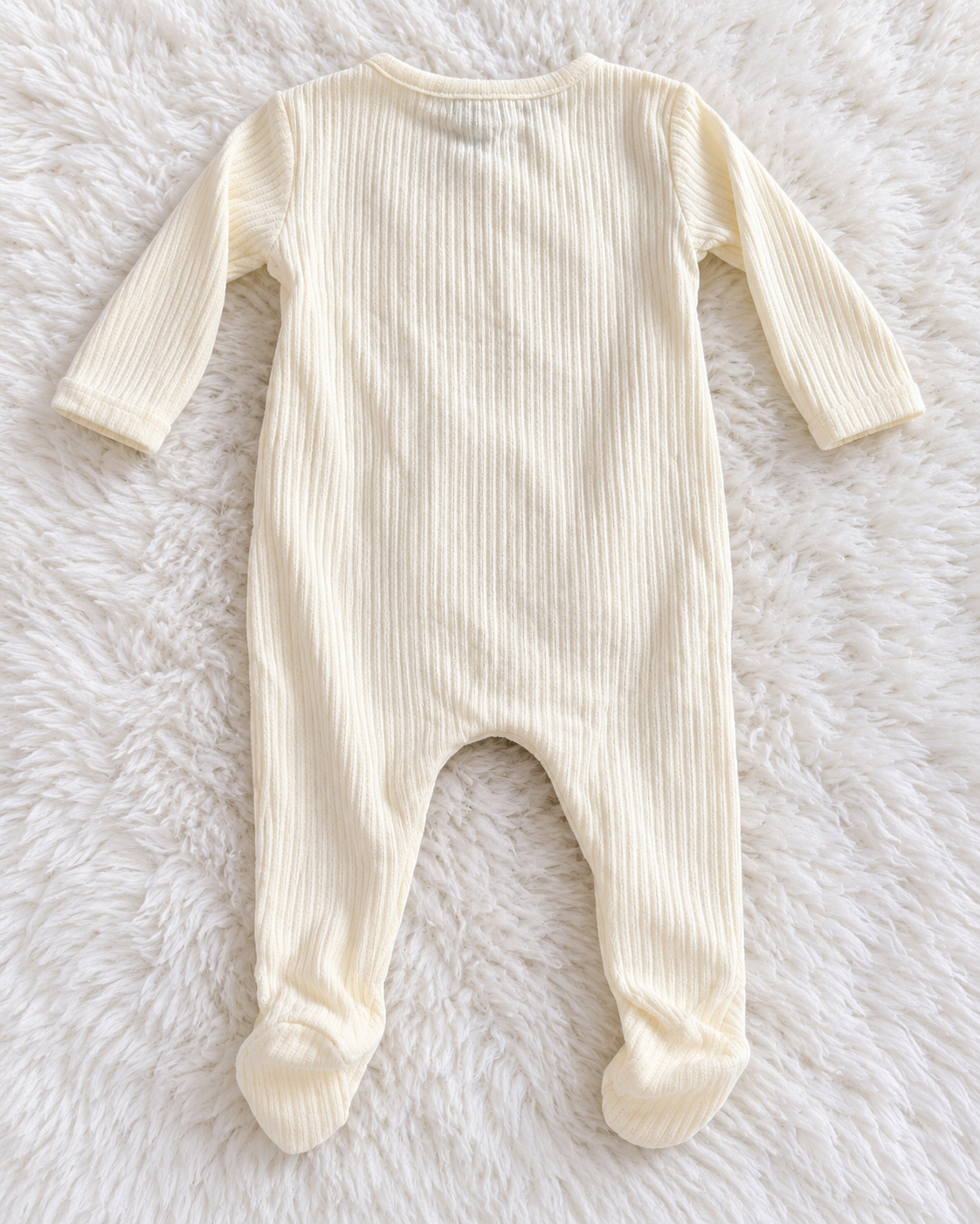 Back of Grayson Collective white ribbed footed romper size 0-3 months