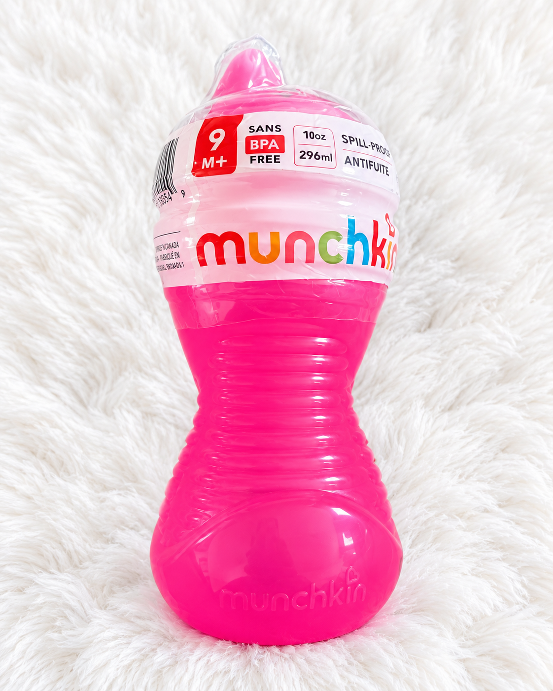 Munchkin pink spill-proof cup 9 months plus 10 ounce