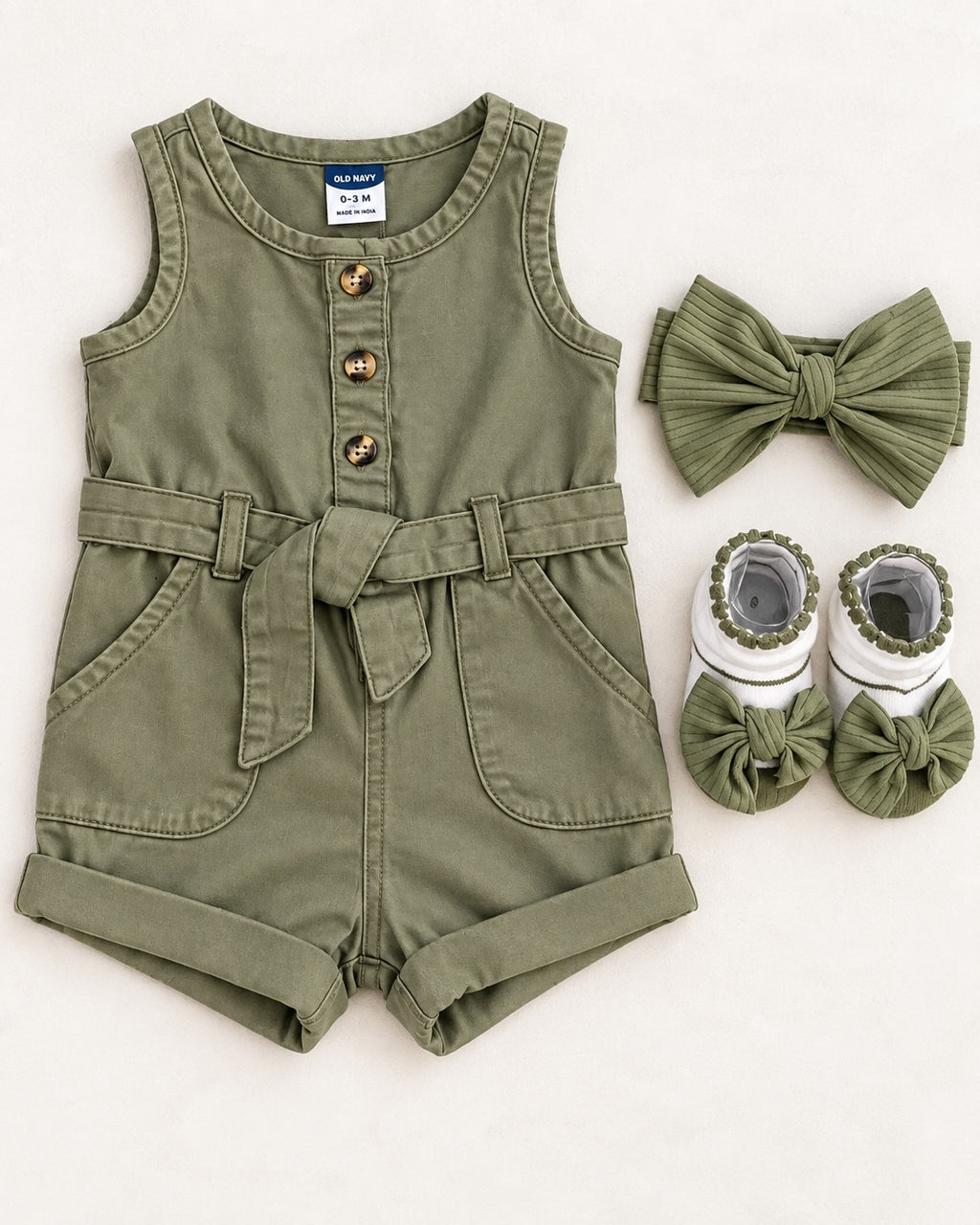 Old Navy olive baby romper with matching bow headwrap and booties, size 0-3 months