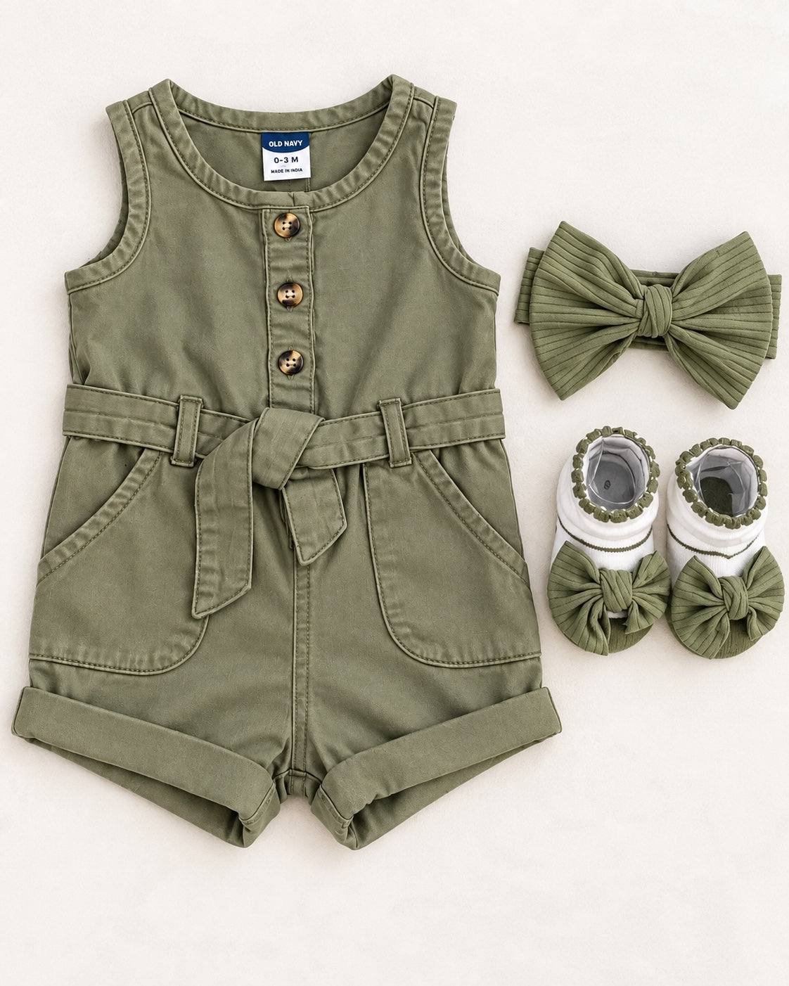 Old Navy olive baby romper with matching bow headwrap and booties, size 0-3 months