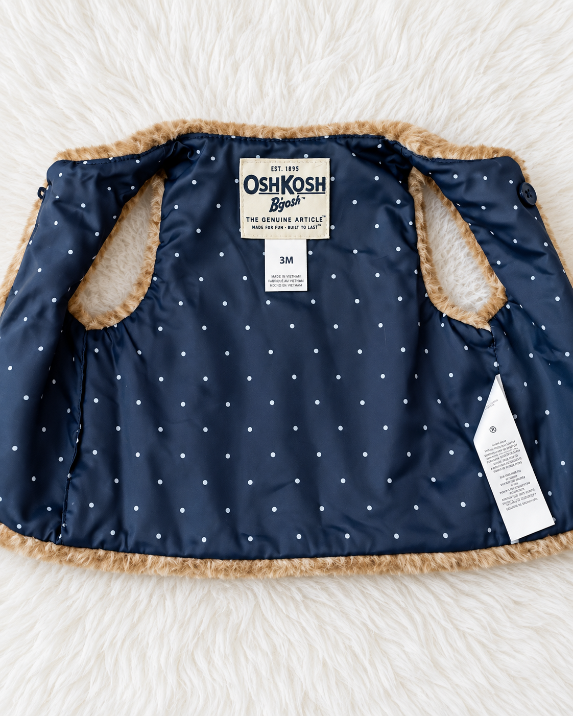 OshKosh B'gosh faux fur baby vest inside lining and 3M size tag