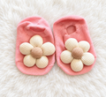 Pink baby socks with cream flower appliques
