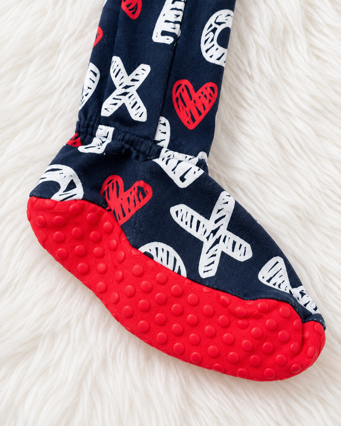 PJ Place footed sleeper red non-slip grip detail