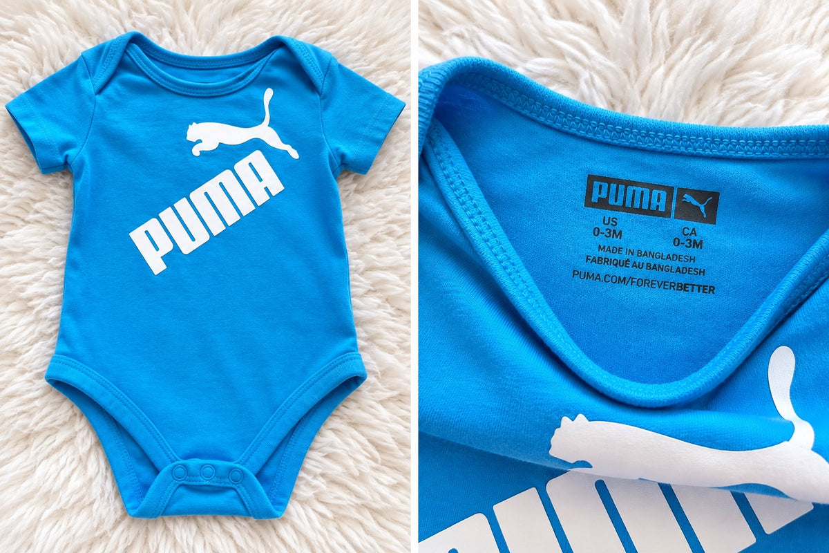 PUMA blue baby bodysuit label detail, size 0-3 months