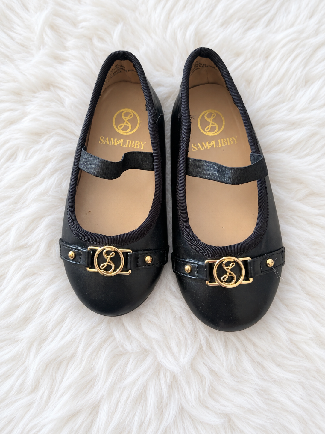 Front view of black Sam & Libby toddler flats