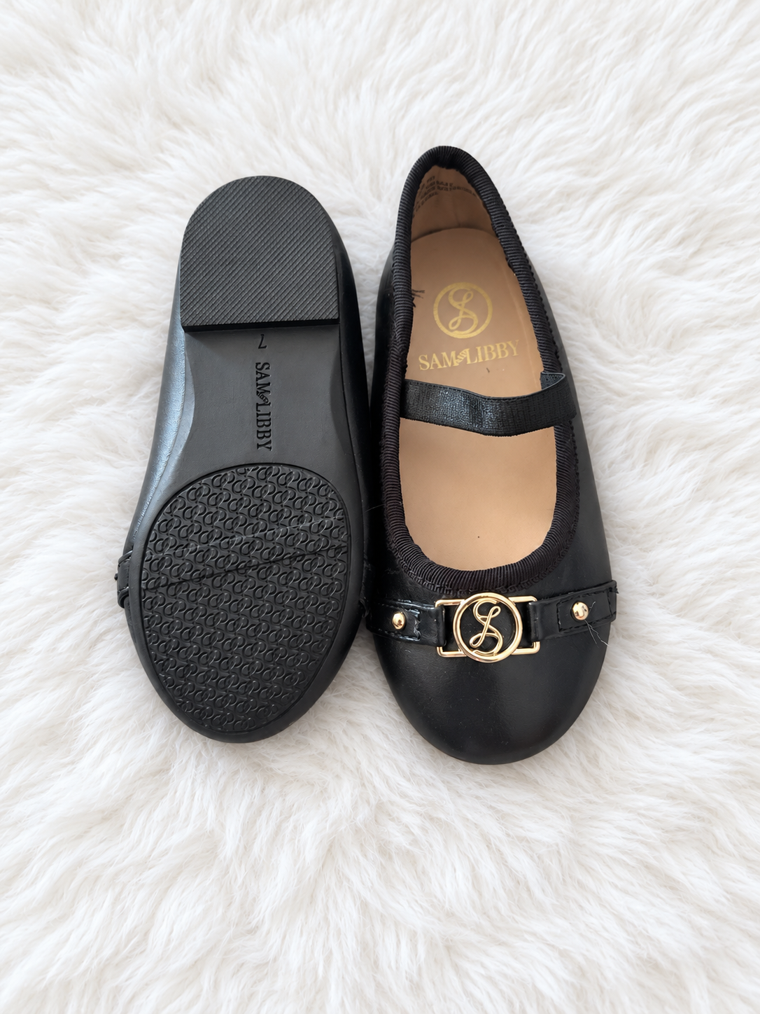 Sole and front view of black Sam & Libby toddler flats