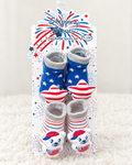 Stepping Stones 2 pair rattle socks set on white rug