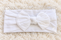 White baby bow headband new in package